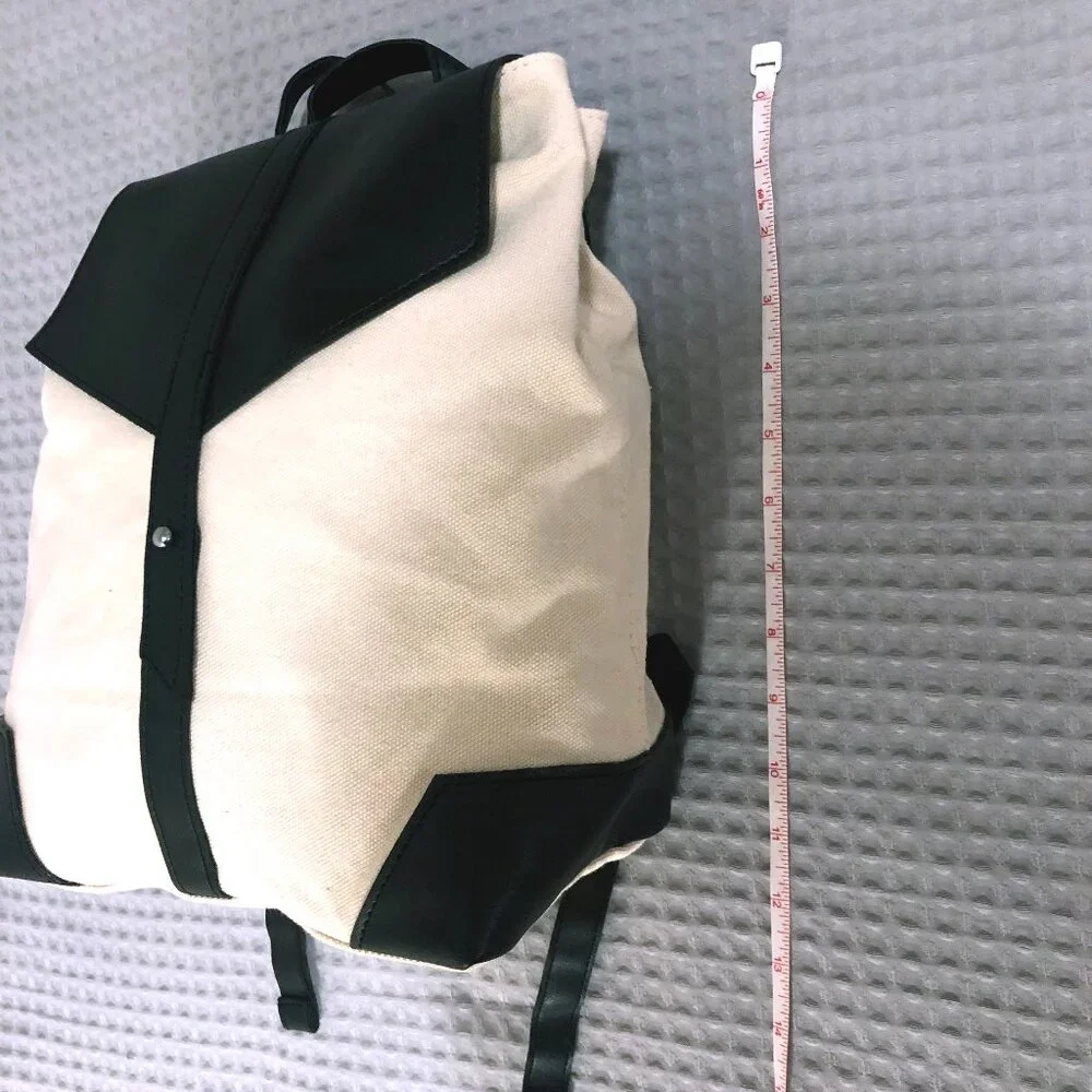 NWOT Deux Lux Black PU Leather White Canvas Backpack
